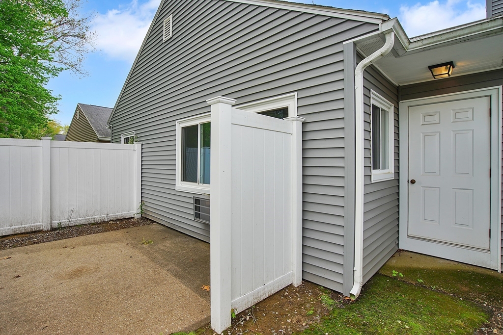 45 Horseshoe Drive, Unit 45 Chicopee, MA 01022 - Photo 7 of 31 a view of a house with a door and wooden floor