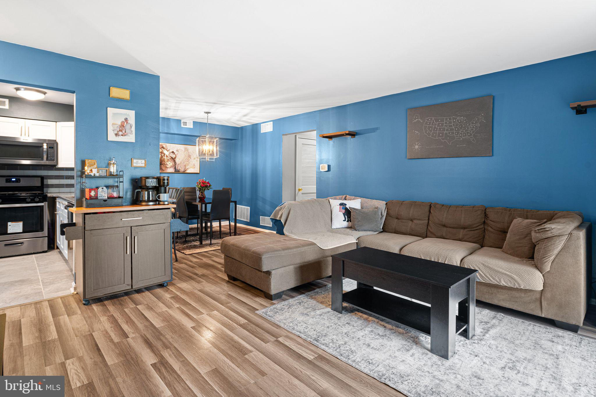 505 A Ralston Drive Mount Laurel, NJ 08054 - Photo 5 of 18 a living room with a couch and a stove top oven