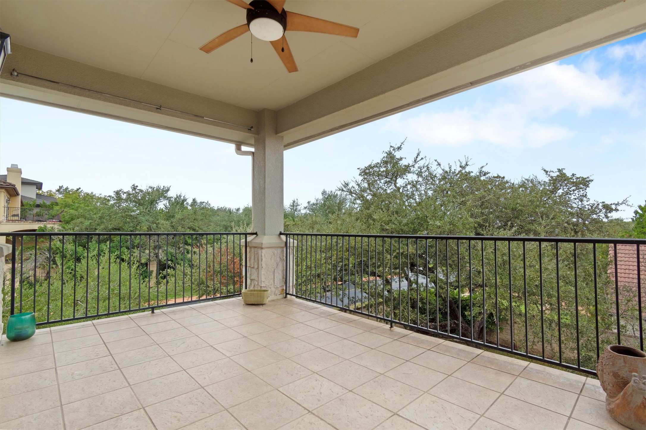 6 Monarch Oaks Lane Austin, TX 78738 - Photo 17 of 40 Balcony featuring a ceiling fan