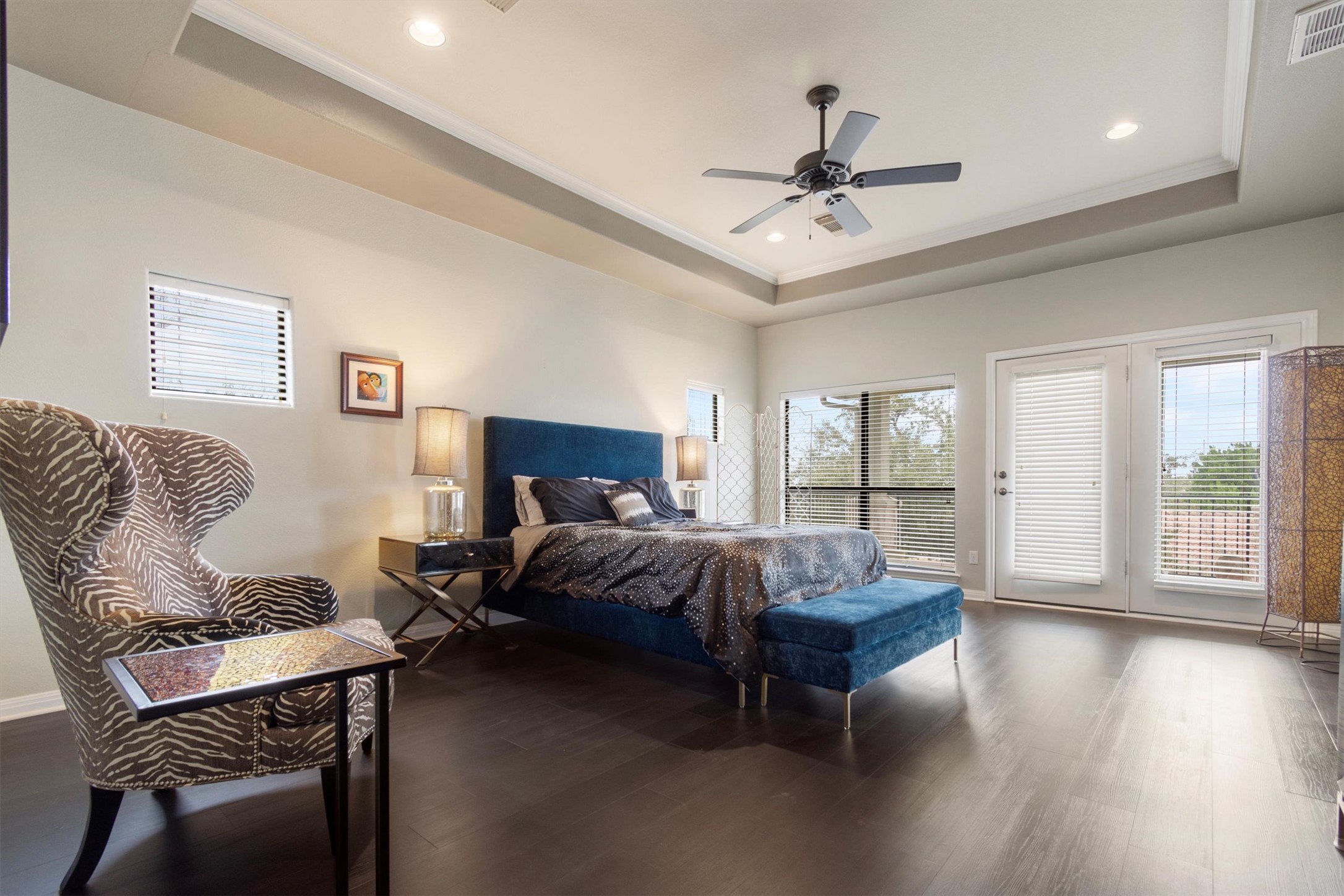 6 Monarch Oaks Lane Austin, TX 78738 - Photo 20 of 40 Bedroom with access to outside, multiple windows, dark wood finished floors, ceiling fan, and recessed lighting
