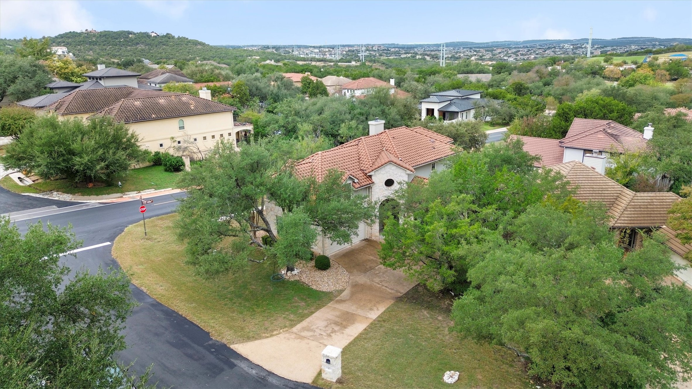 6 Monarch Oaks Lane Austin, TX 78738 - Photo 3 of 40 Aerial perspective of suburban area