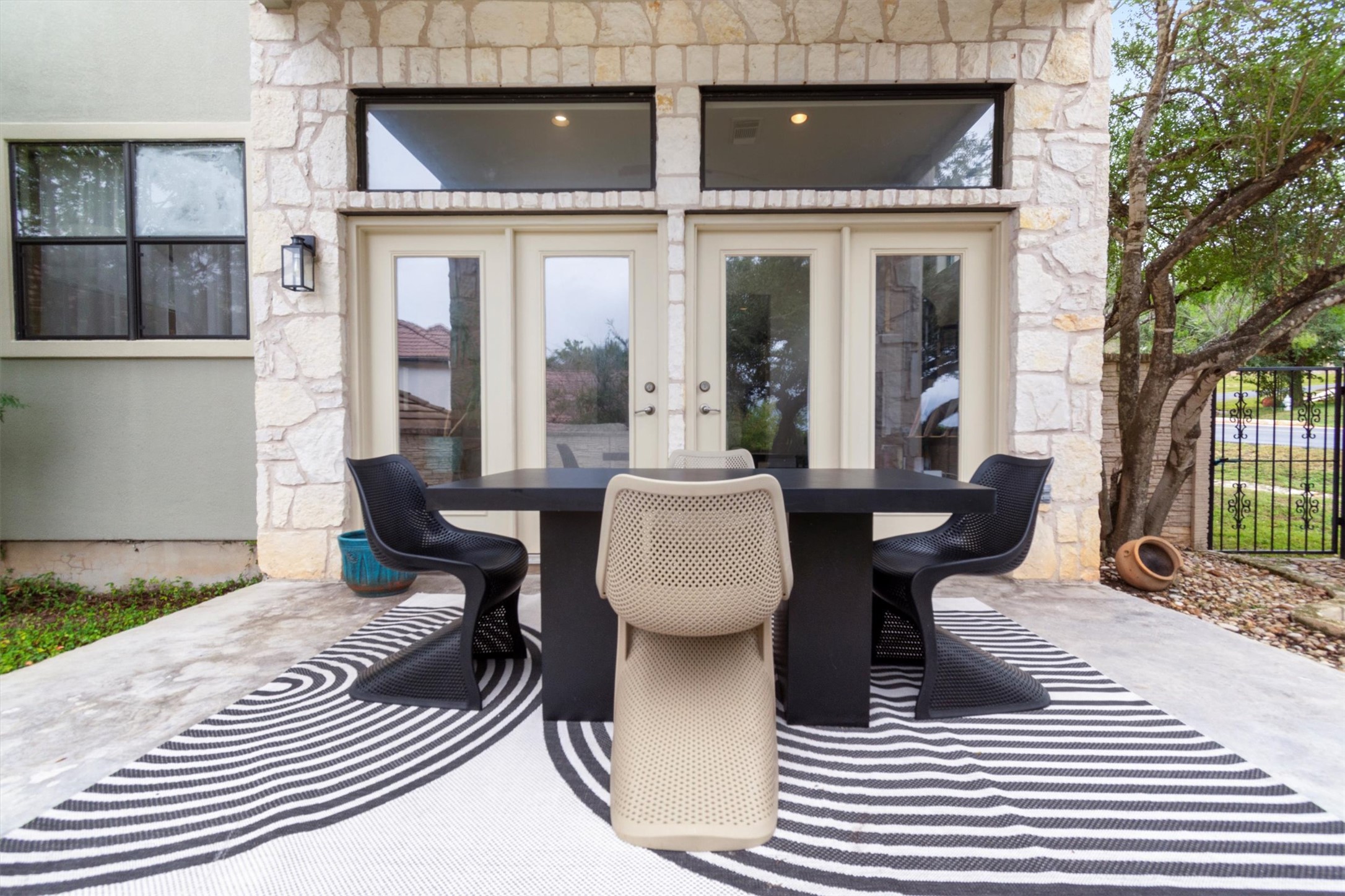 6 Monarch Oaks Lane Austin, TX 78738 - Photo 32 of 40 View of patio / terrace featuring outdoor dining area