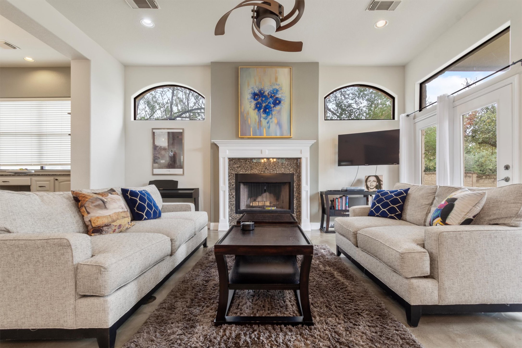 6 Monarch Oaks Lane Austin, TX 78738 - Photo 4 of 40 Living room with ceiling fan, recessed lighting, and a premium fireplace