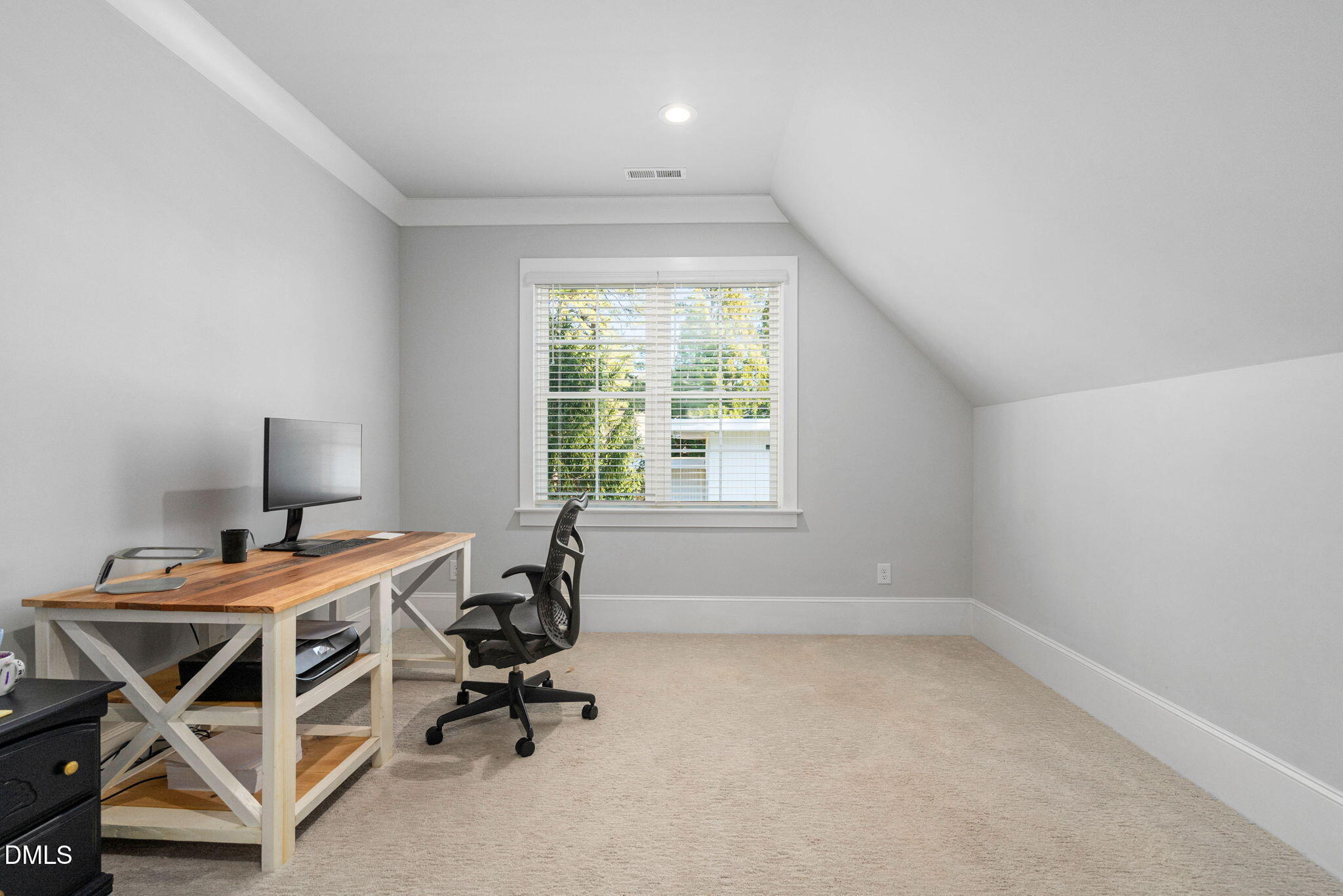 3417 Edgemont Drive Raleigh, NC 27612 - Photo 53 of 83 a view of a workspace with furniture and a window