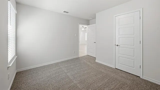 an empty room with closet