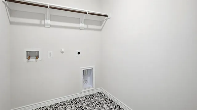 a view of kitchen with stainless steel appliances kitchen island wooden floor and living room view