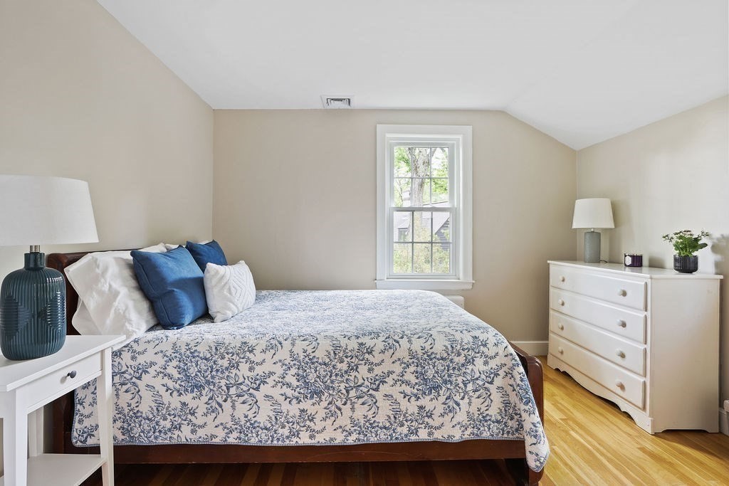 28 Appleton Road Needham, MA 02492 - Photo 14 of 24 a bedroom with a bed and window