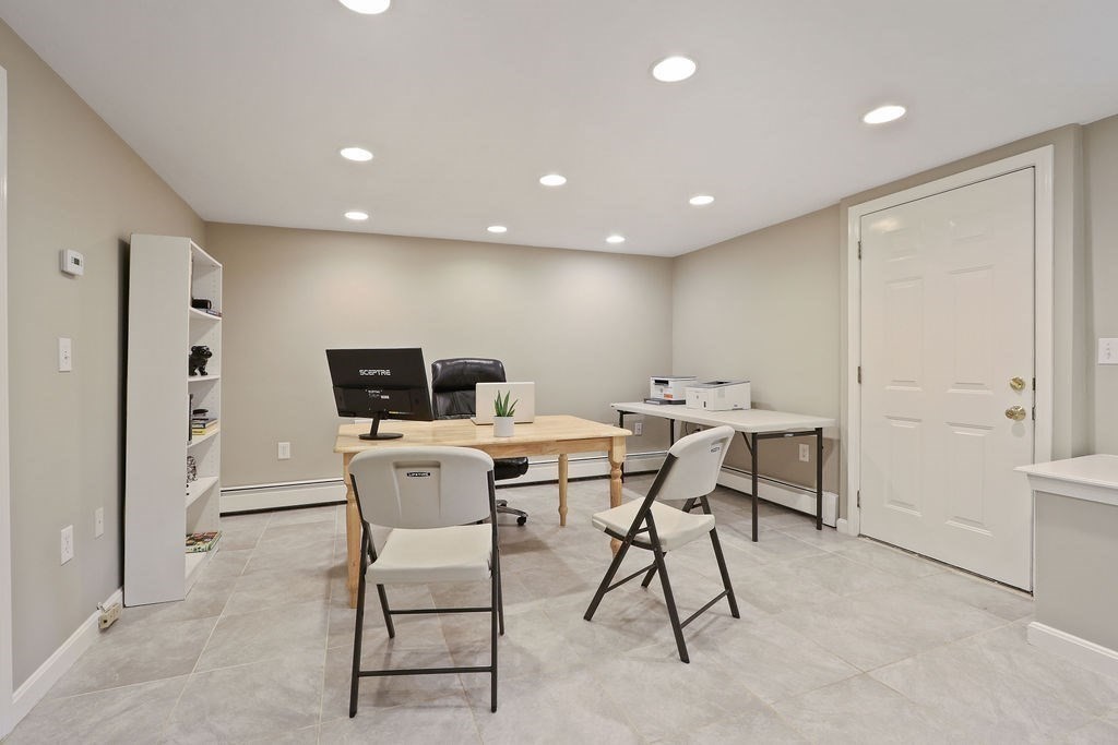 28 Appleton Road Needham, MA 02492 - Photo 17 of 24 a view of a dining room with furniture