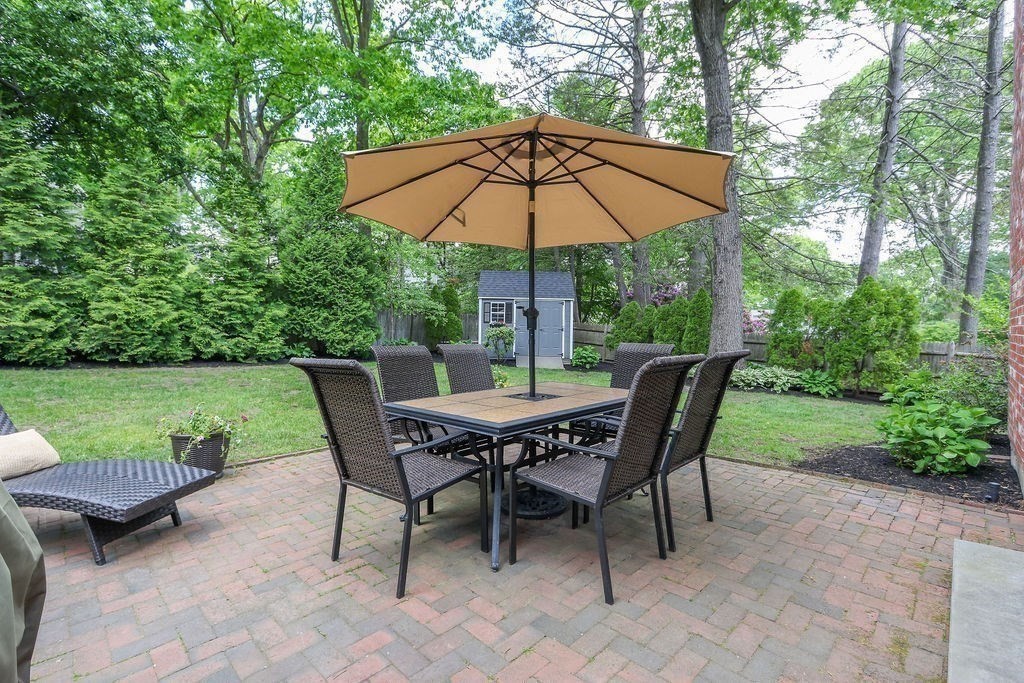 28 Appleton Road Needham, MA 02492 - Photo 22 of 24 a view of an outdoor sitting area with furniture and a yard