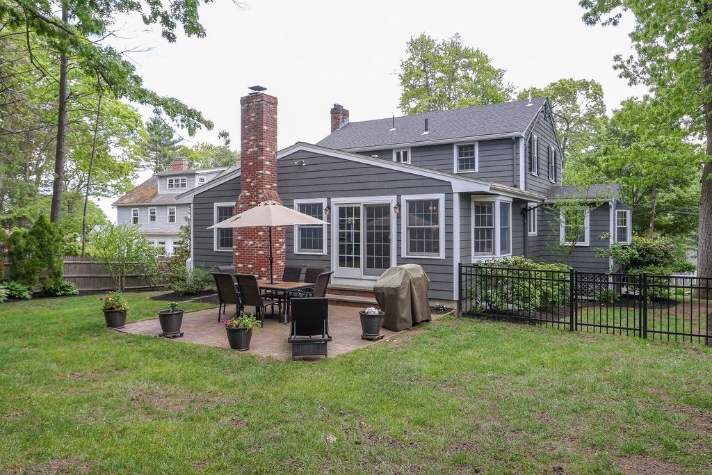 28 Appleton Road Needham, MA 02492 - Photo 23 of 24 a view of a house with backyard sitting area and garden