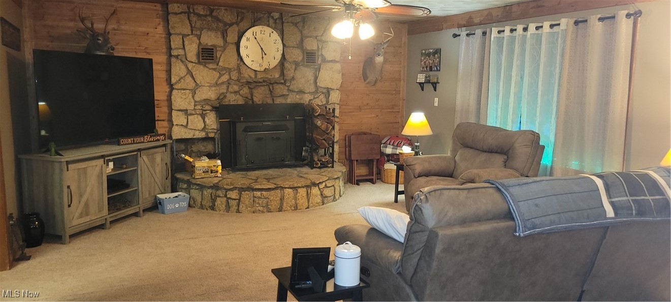 12980 Portie-Flamingo Road Corning, OH 43730 - Photo 3 of 30 Carpeted living room featuring ceiling fan