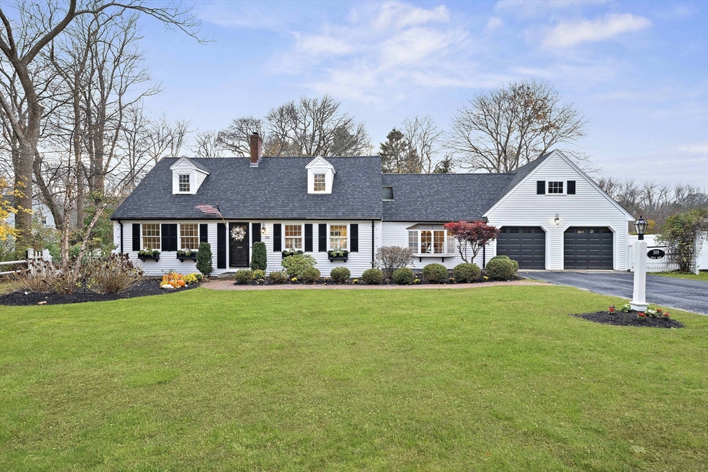 309 South Main Street Cohasset, MA 02025 - Photo 1 of 35 a front view of a house with a yard