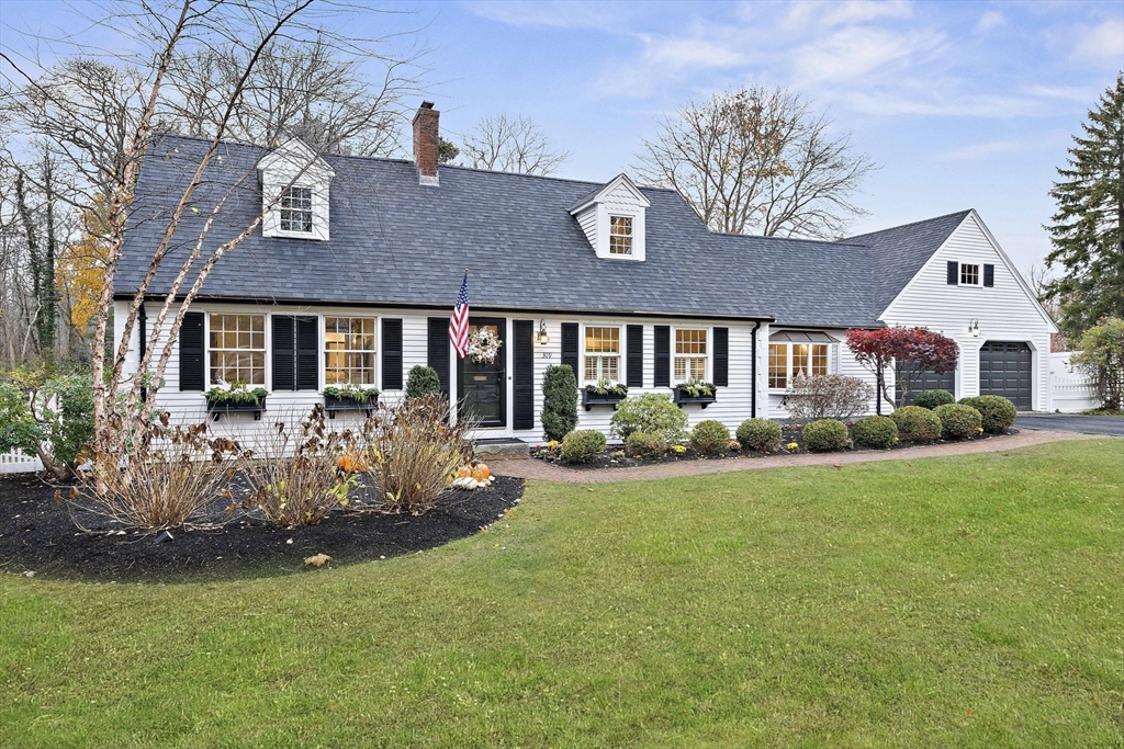 309 South Main Street Cohasset, MA 02025 - Photo 2 of 35 a front view of a house with garden