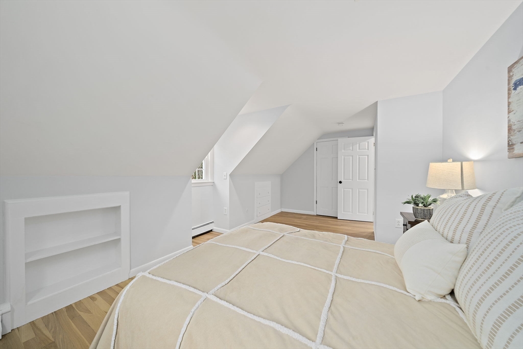 309 South Main Street Cohasset, MA 02025 - Photo 27 of 35 a bedroom with a bed and a window