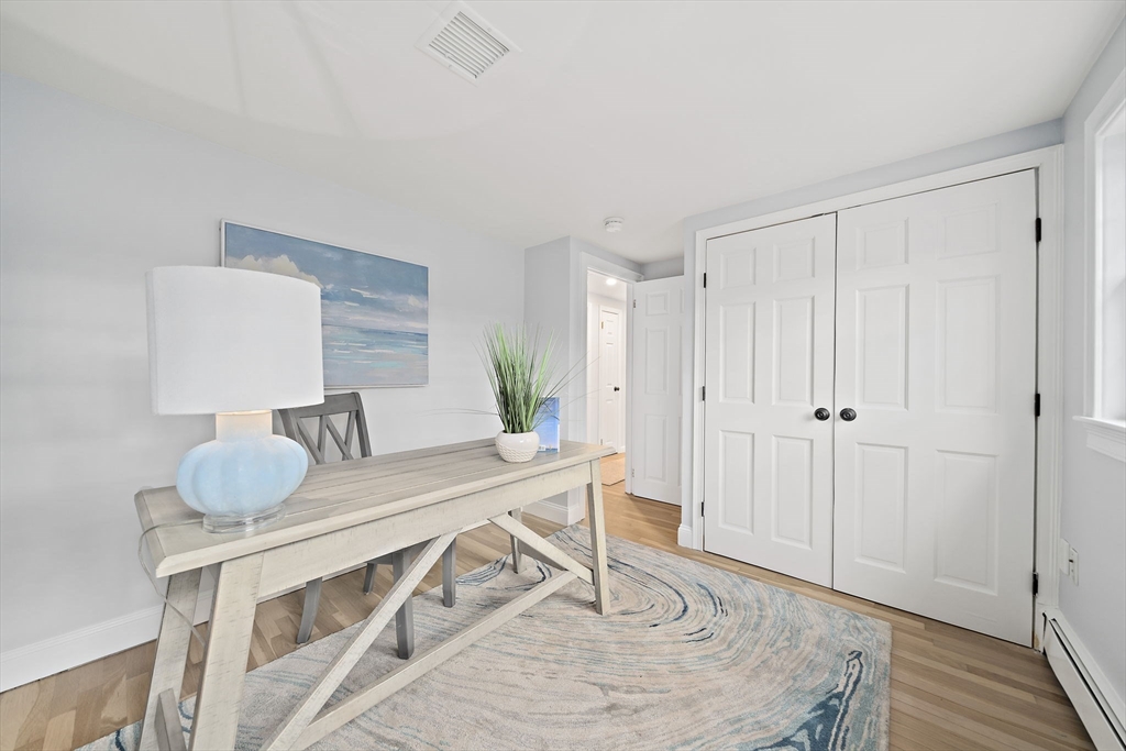 309 South Main Street Cohasset, MA 02025 - Photo 29 of 35 a view of a dining room with furniture and wooden floor