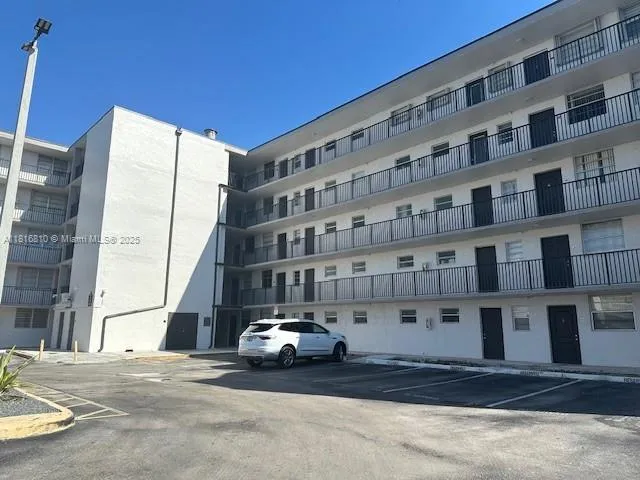 a car parked in front of a building