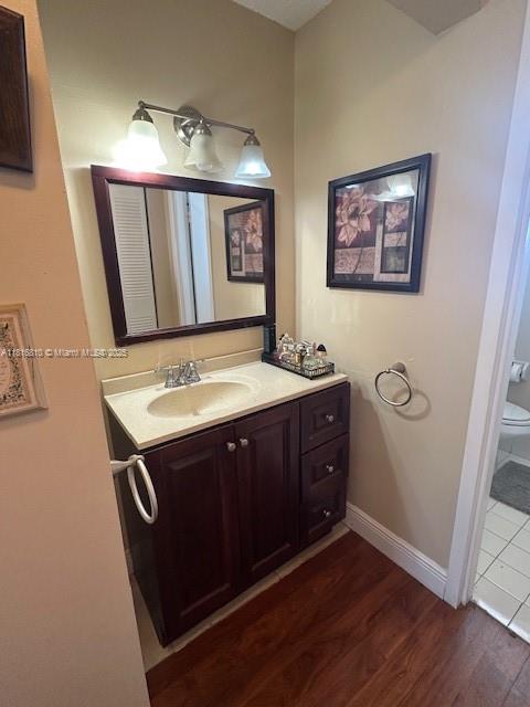 Kendale Lakes Miami, FL 33183 - Photo 12 of 19 a view with cabinets a sink and a mirror