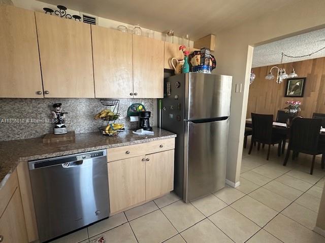 Kendale Lakes Miami, FL 33183 - Photo 6 of 19 a kitchen with stainless steel appliances granite countertop a refrigerator and a sink