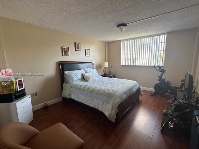 Kendale Lakes Miami, FL 33183 - Photo 10 of 19 a bedroom with a bed and wooden floor