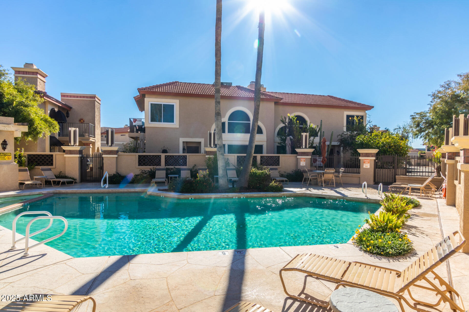 10410 North Cave Creek Road, Unit 2006 Phoenix, AZ 85020 - Photo 22 of 29 a front view of a house with garden