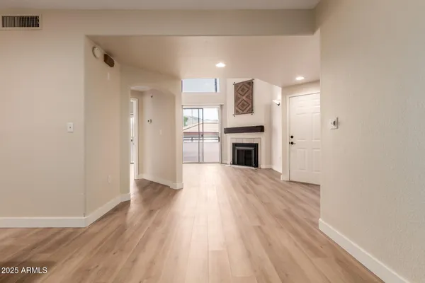 a view of kitchen with wooden floor
