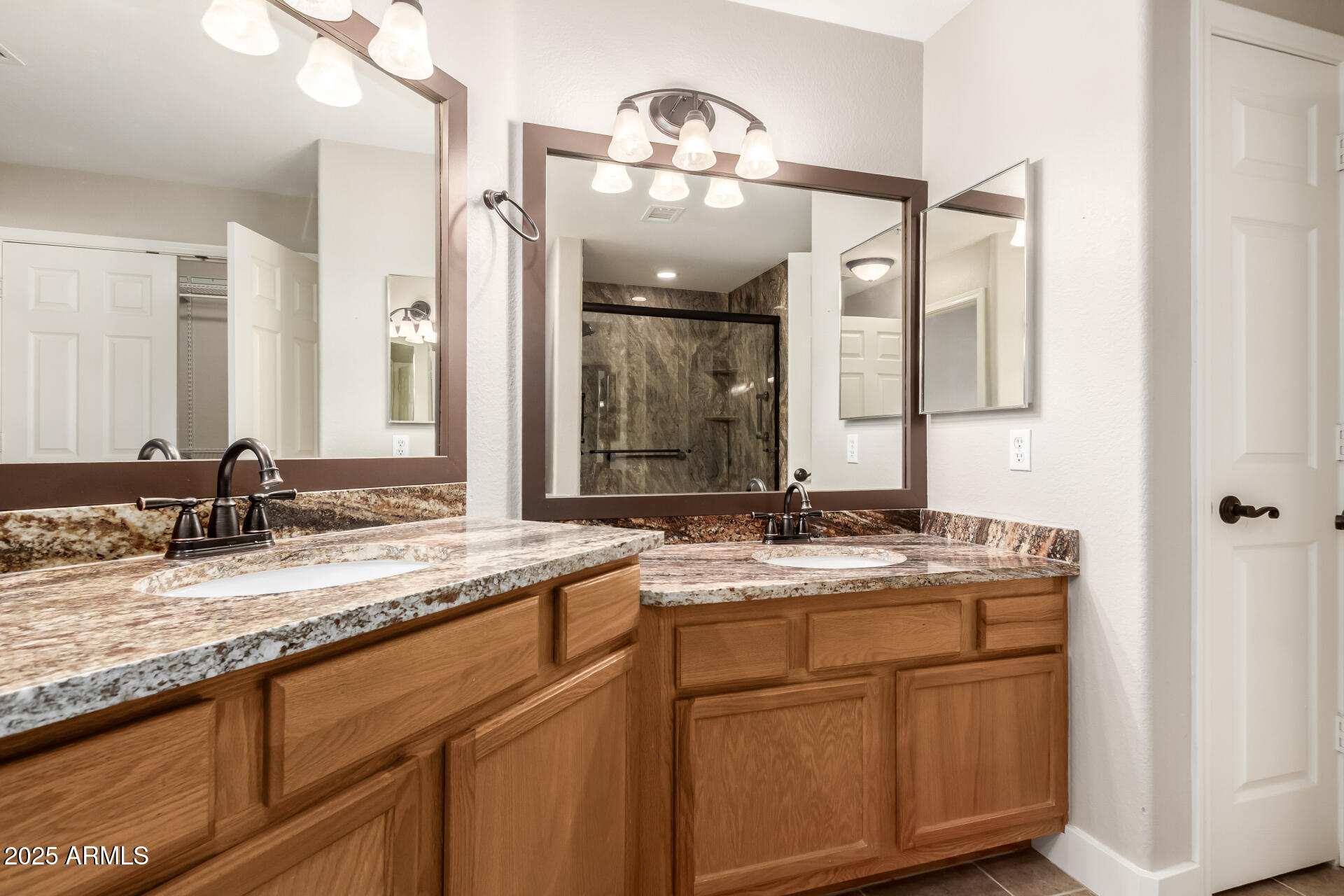 10410 North Cave Creek Road, Unit 2006 Phoenix, AZ 85020 - Photo 3 of 29 a bathroom with a granite countertop sink double vanity and a mirror