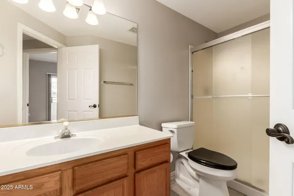 a bathroom with a sink and a toilet
