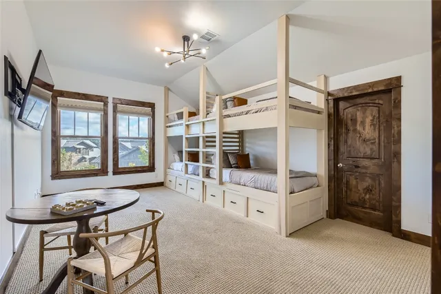 a living room with furniture and windows