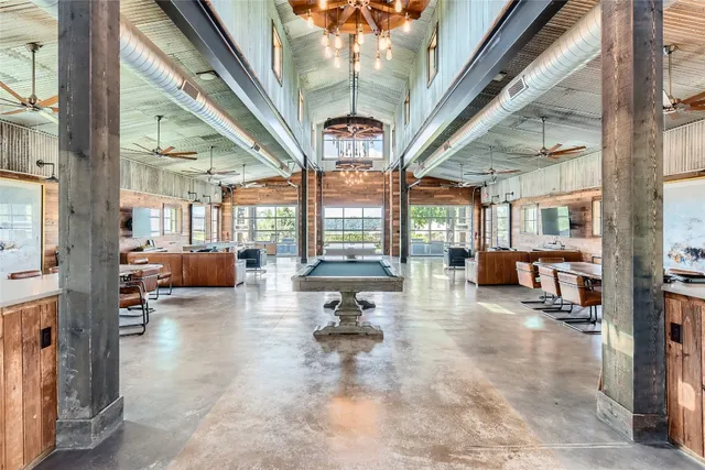 a lobby with furniture and a large window