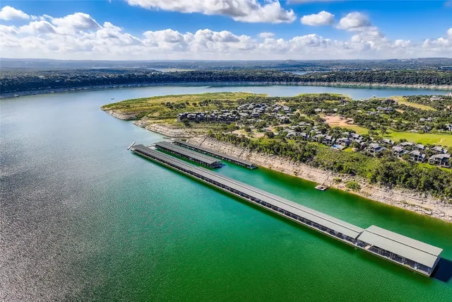 a view of a lake with a city view
