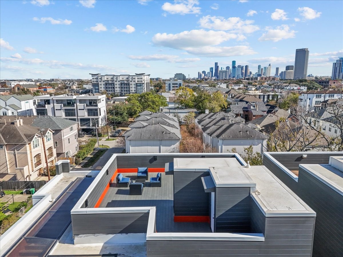 The oversized rooftop deck overlooks the city skyline, offering breathtaking views — it truly doesn’t get better than this.