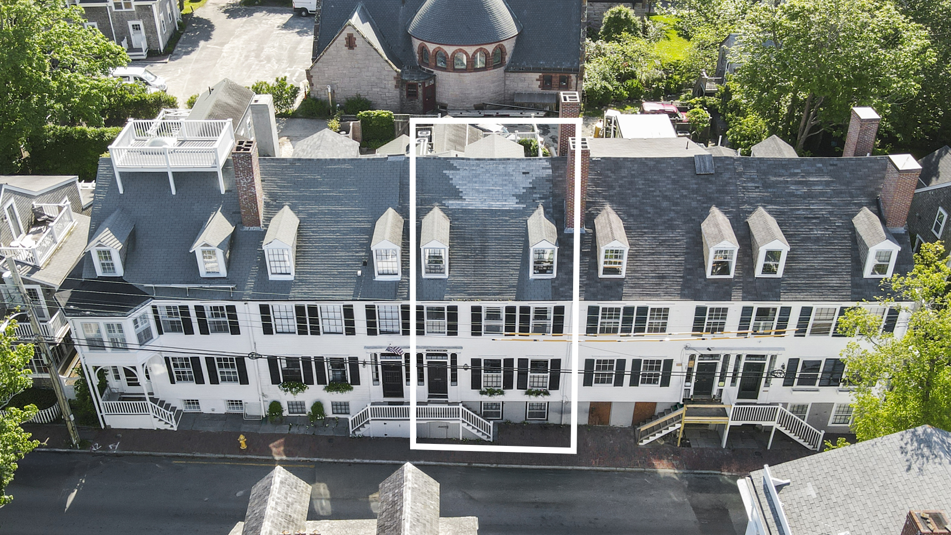19 Orange Street Nantucket, MA 02554 - Photo 1 of 85 a front view of a building with street view