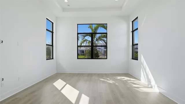 an empty room with windows