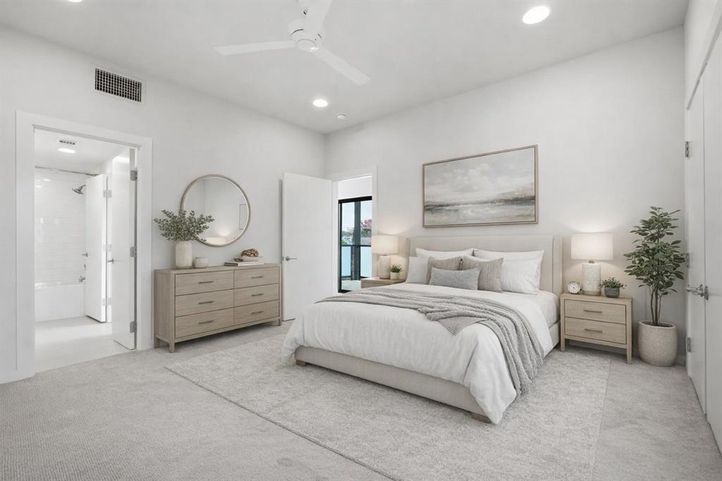 2802 Lee Street Dallas, TX 75206 - Photo 25 of 40 a bedroom with a bed mirror and window