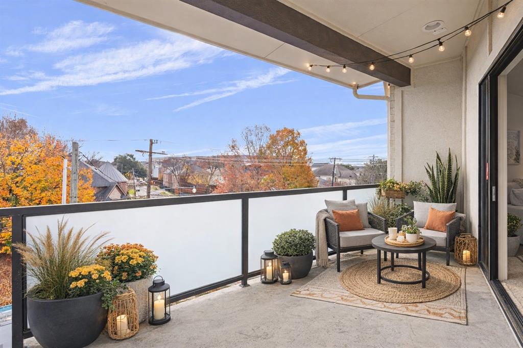2802 Lee Street Dallas, TX 75206 - Photo 31 of 40 a roof deck with couches and potted plants