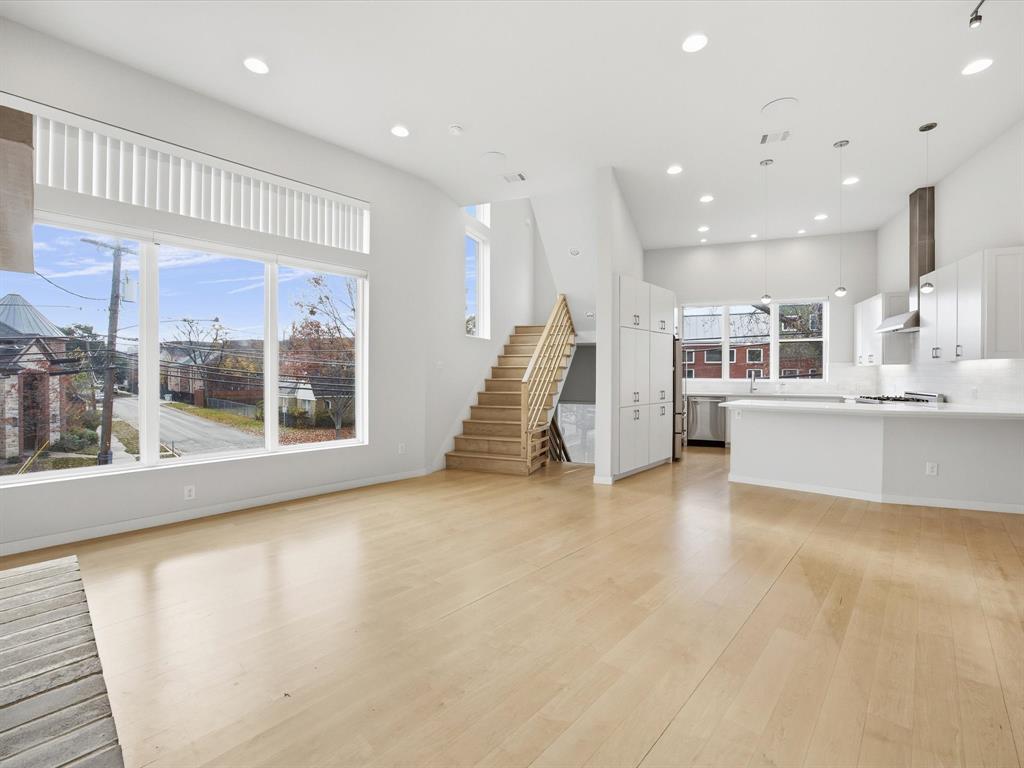 2802 Lee Street Dallas, TX 75206 - Photo 10 of 40 a view of a kitchen with a sink and a large window