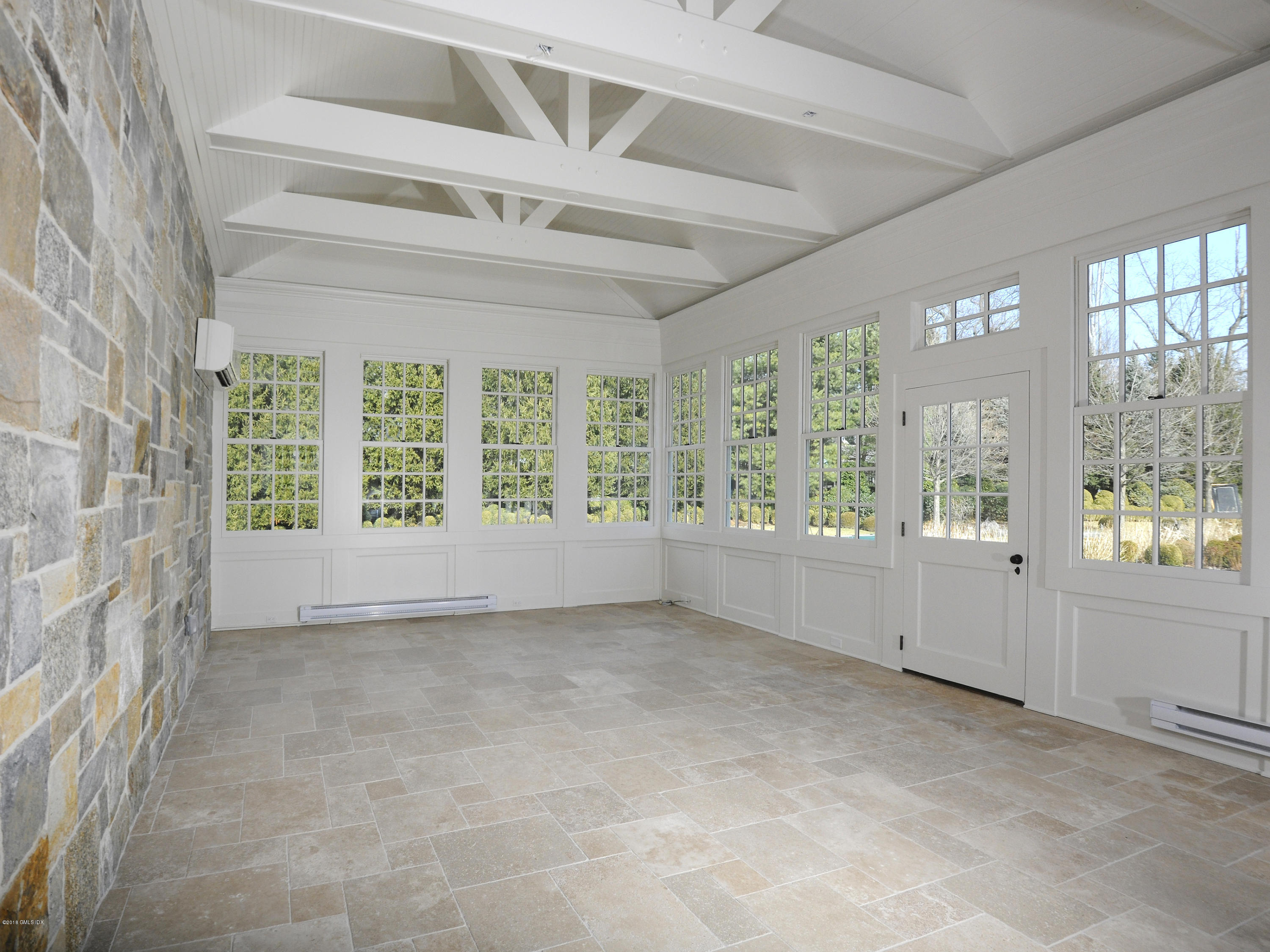 2 Deer Park Meadow Road Greenwich, CT 06830 - Photo 13 of 28 a view of an empty room with a window