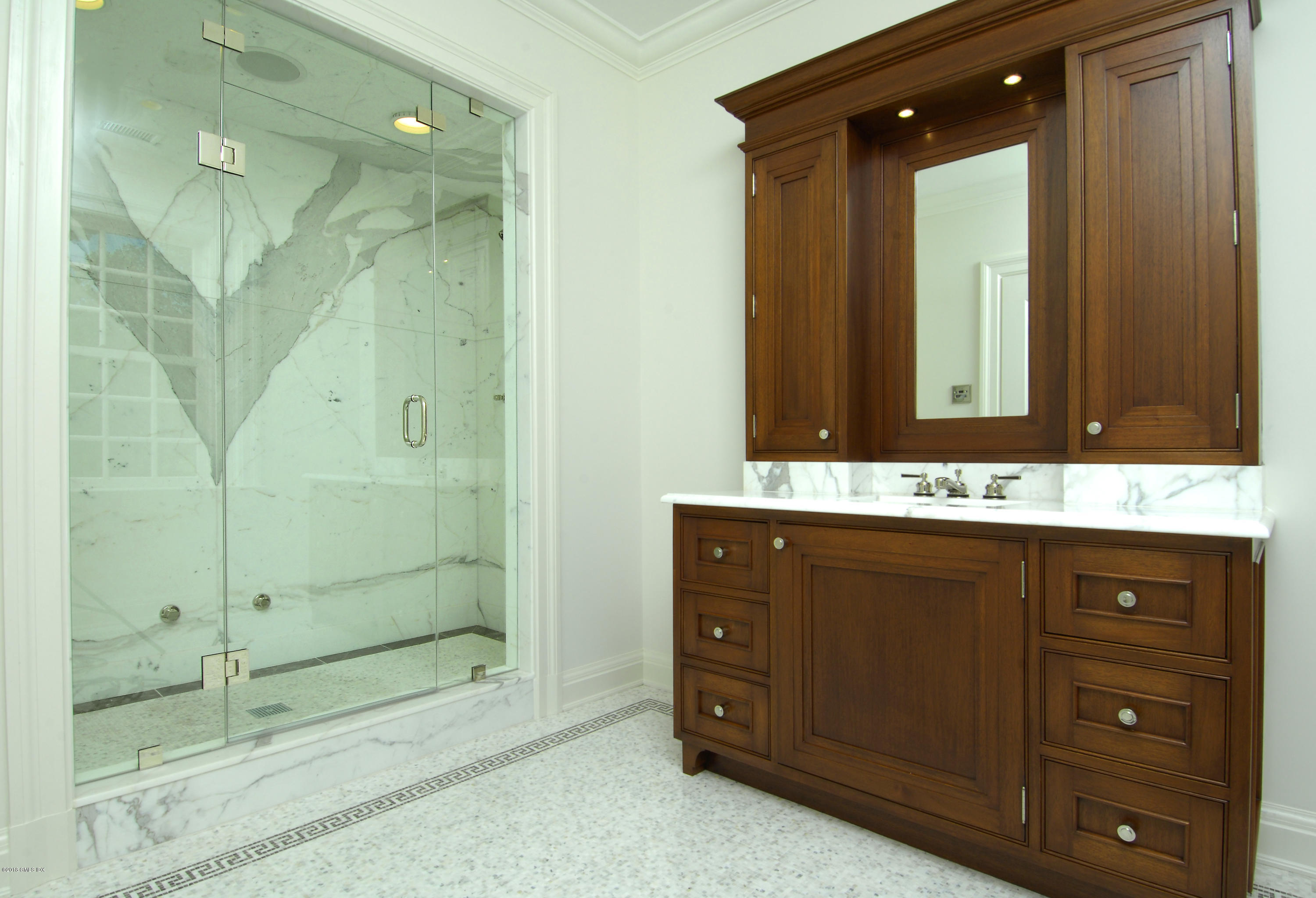 2 Deer Park Meadow Road Greenwich, CT 06830 - Photo 17 of 28 a bathroom with a sink and a mirror