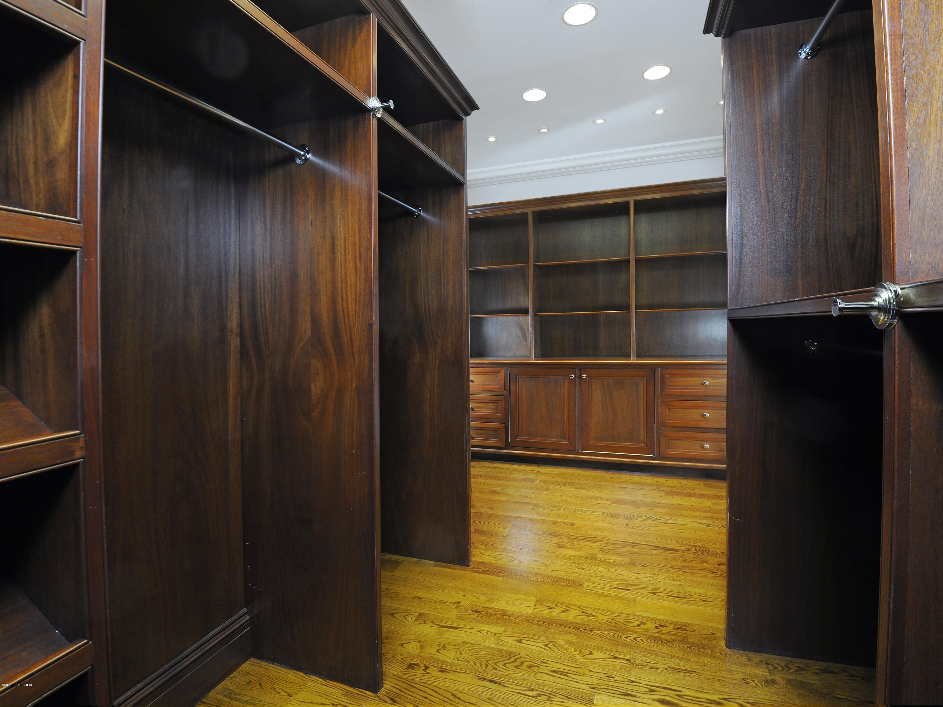2 Deer Park Meadow Road Greenwich, CT 06830 - Photo 19 of 28 a view of an empty room with wooden floor and a window