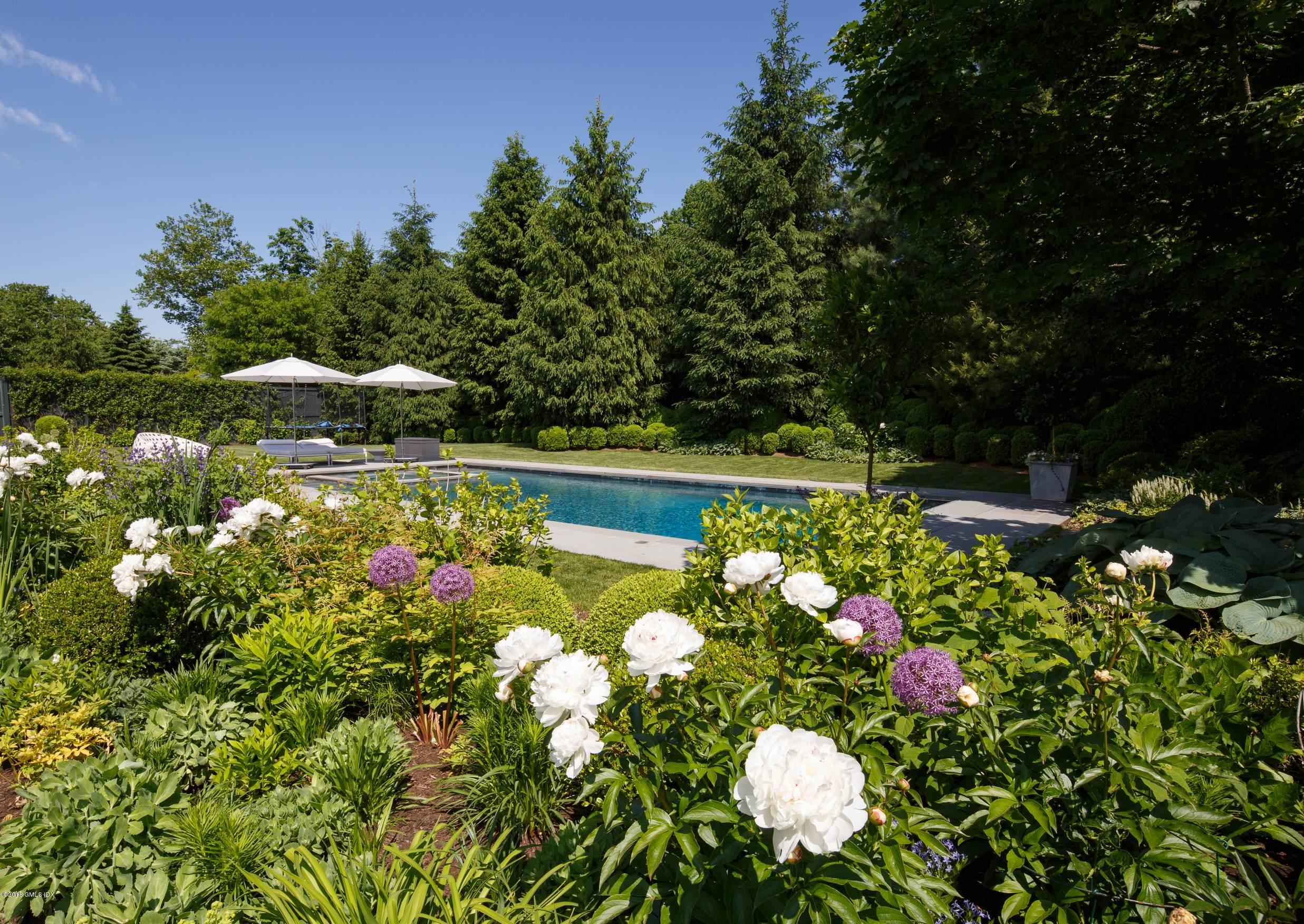 2 Deer Park Meadow Road Greenwich, CT 06830 - Photo 26 of 28 a view of a flower in a garden