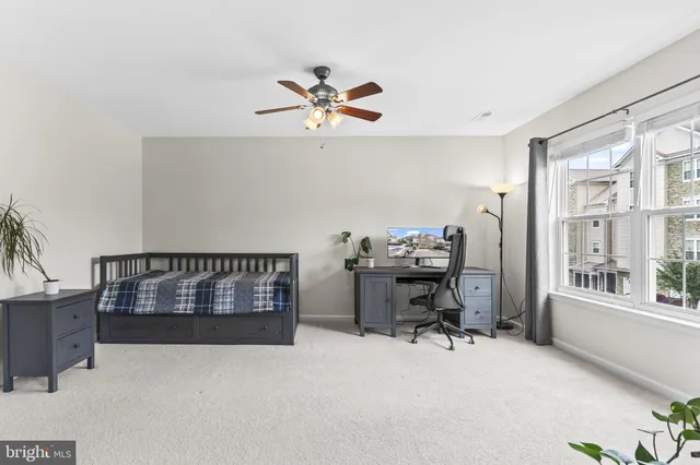 a view of a livingroom with a furniture