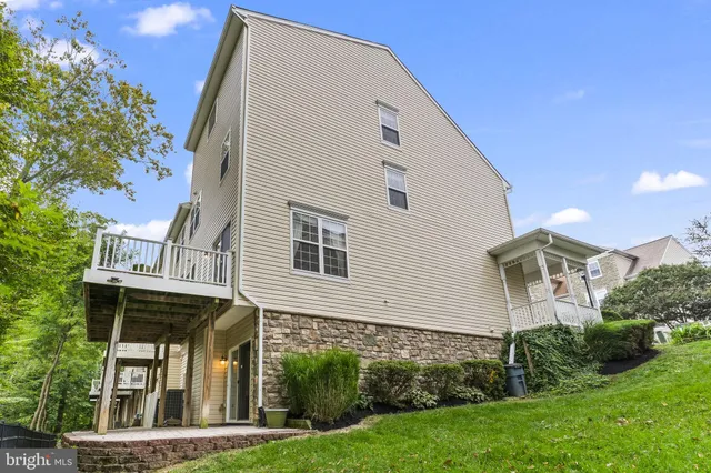 a picture of a room with a white wall and a picture