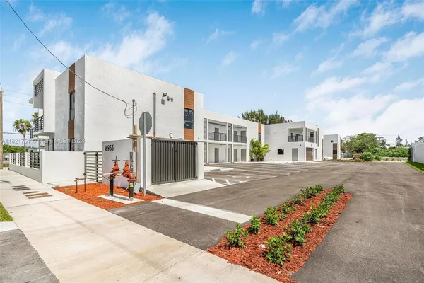 a view of a street with a building