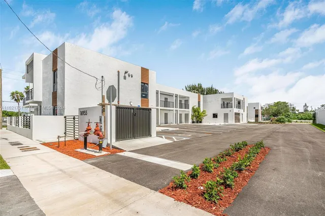 a view of a street with a building
