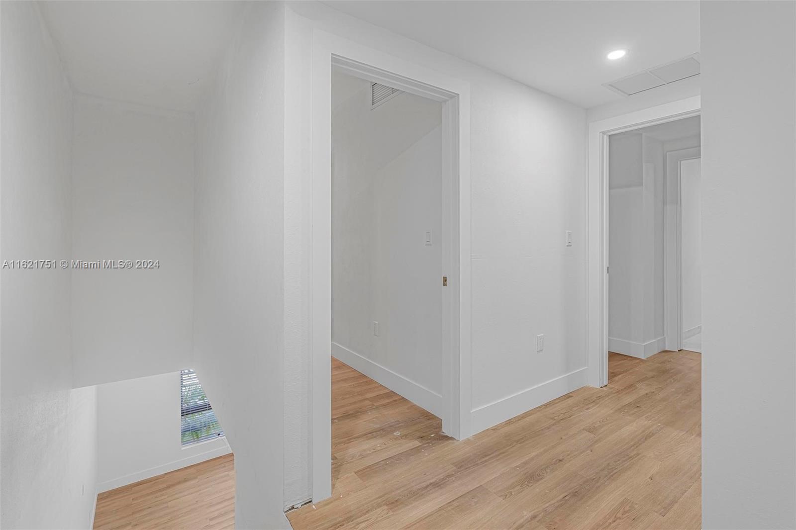 16955 Southwest 100th Avenue Miami, FL 33157 - Photo 25 of 36 a view of hallway with wooden floor