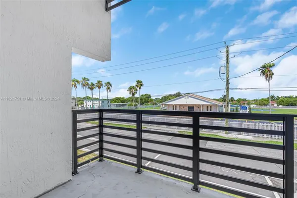 a view of a balcony with an outdoor space