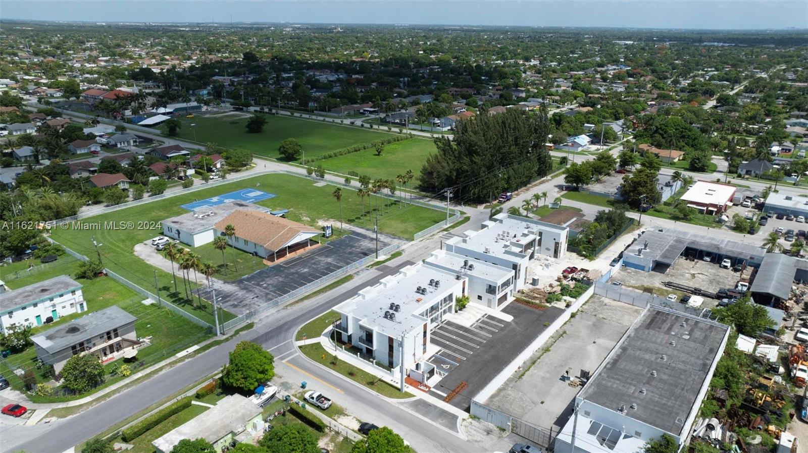 16955 Southwest 100th Avenue Miami, FL 33157 - Photo 36 of 36 an aerial view of a city with lake view