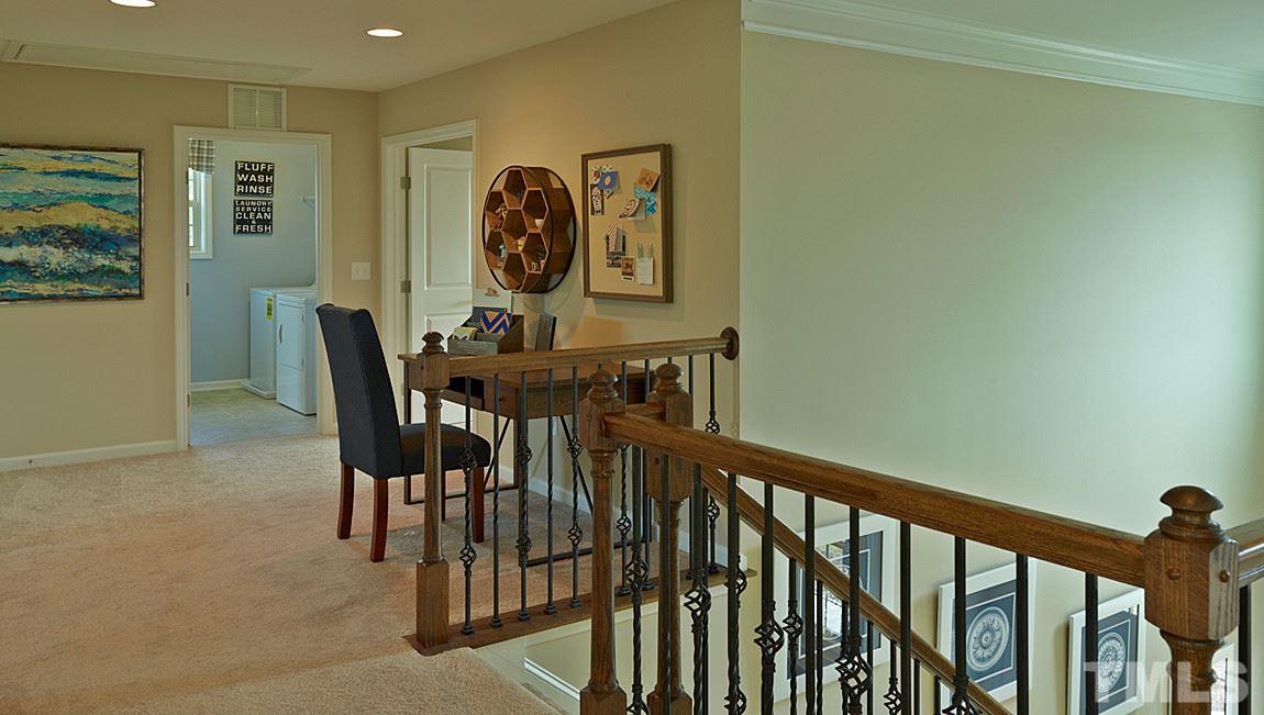 7427 Randshire Way Raleigh, NC 27616 - Photo 11 of 25 Completed Fleetwood E--for illustration purposes only, home listed is a Fleetwood D but will vary with exterior colors & interior appts. Furnishings & knick knacks not included in sales price nor are they in completed home. This home is under construction