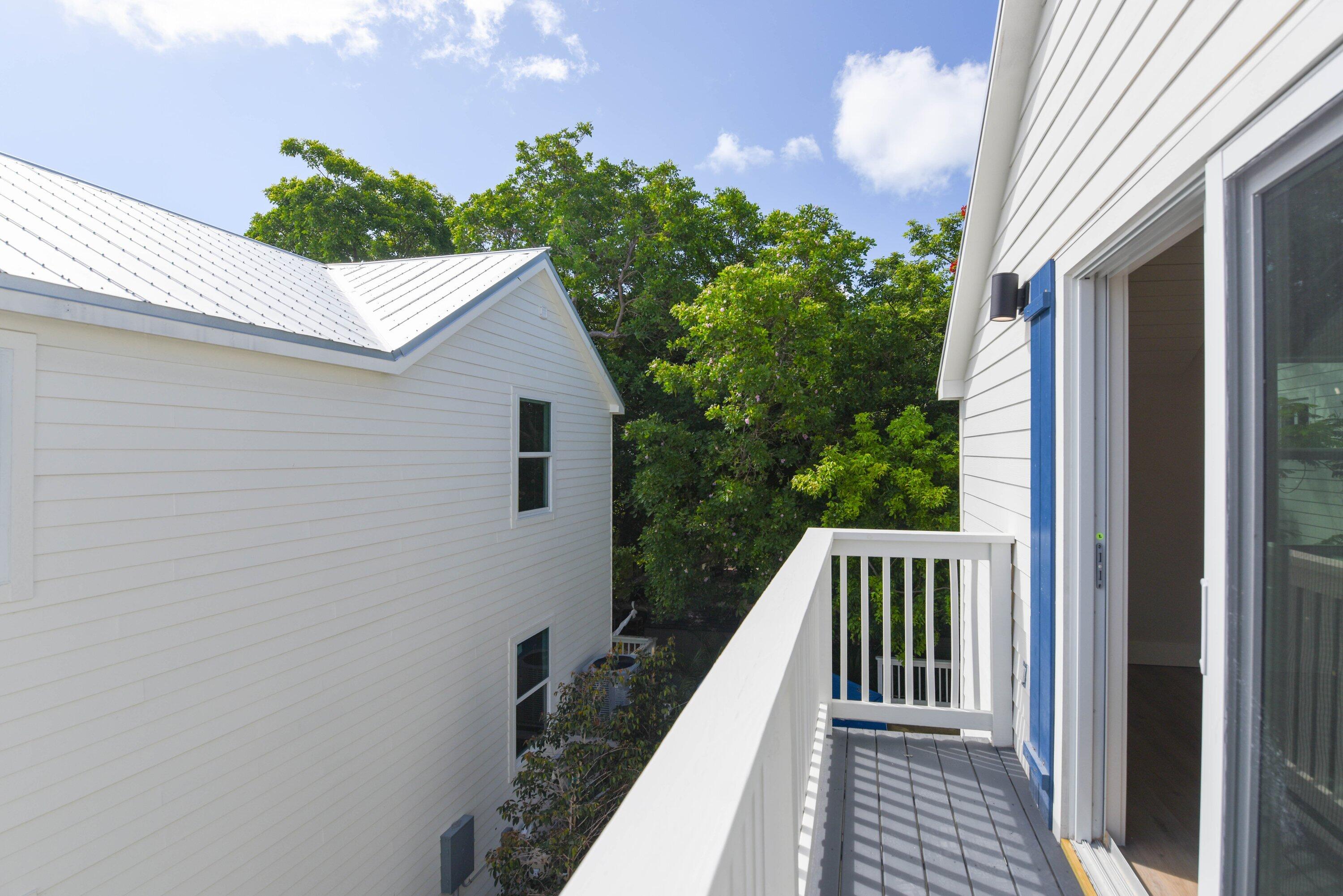 1316 Royal Street, Unit 6 Key West, FL 33040 - Photo 32 of 43 Primary Bedroom Balcony