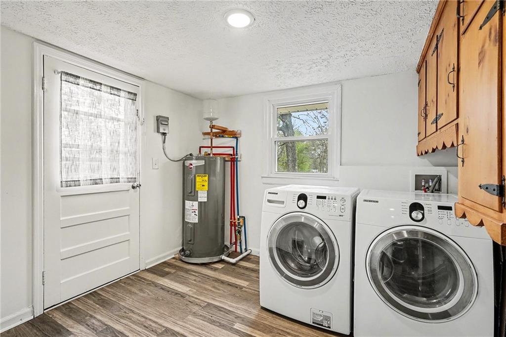 360 Ridge Road Canton, GA 30114 - Photo 15 of 16 a view of a bedroom with washer and dryer